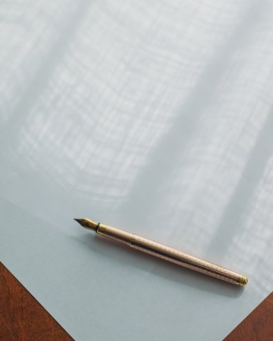 Kroontjespen en leeg papier